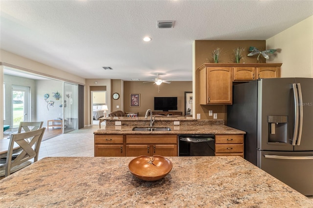 kitchen with a textured ceiling, black dishwasher, stainless steel fridge with ice dispenser, sink, and ceiling fan