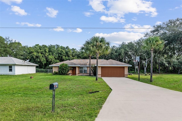 single story home featuring a garage and a front yard