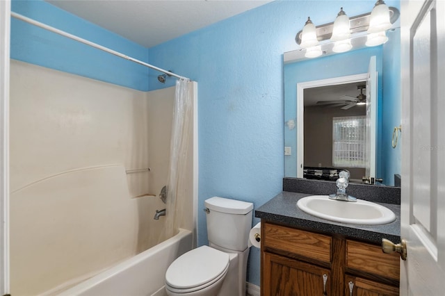 full bathroom with vanity, shower / tub combo, ceiling fan, and toilet