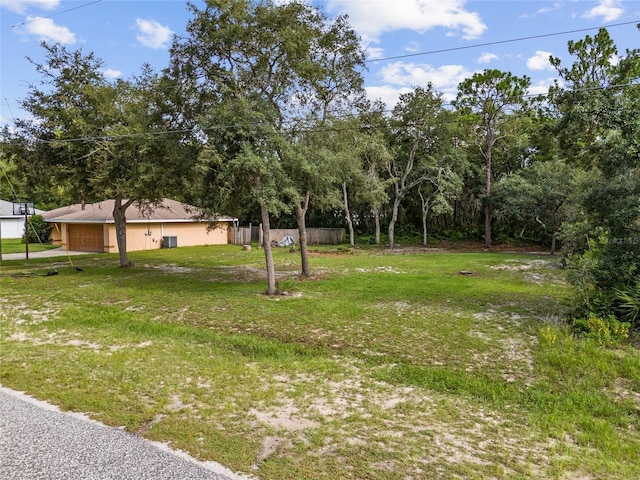 view of yard with a garage