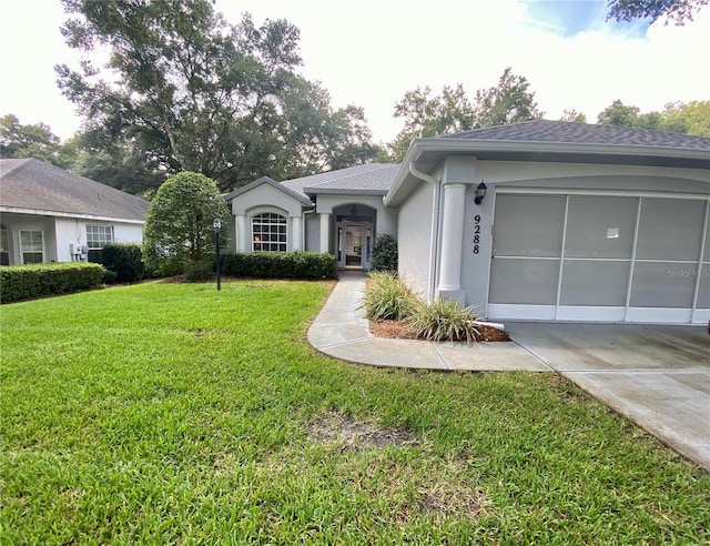 ranch-style home with a front lawn