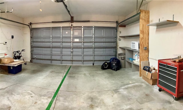 garage with an AC wall unit