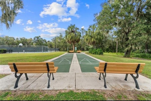 view of community featuring a lawn