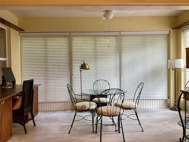 9288 SW 192nd Court Rd, Dunnellon, FL 34432 - dining space with a textured wall and a ceiling fan