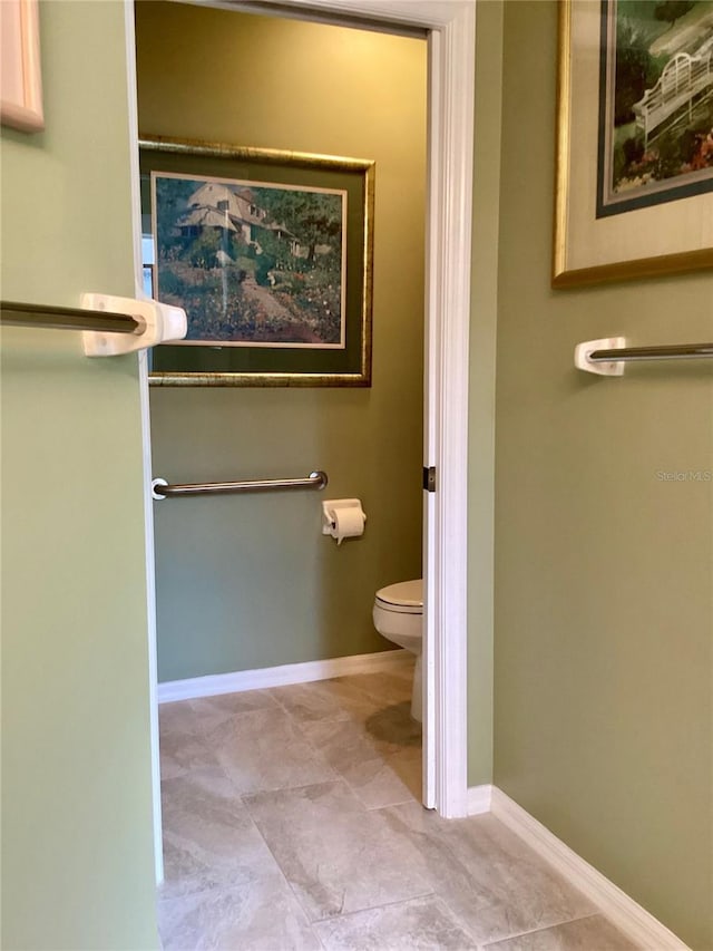 9288 SW 192nd Court Rd, Dunnellon, FL 34432 - bathroom with toilet and baseboards