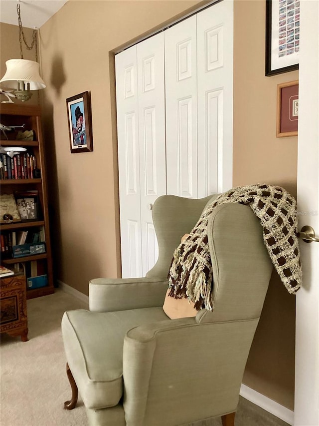 9288 SW 192nd Court Rd, Dunnellon, FL 34432 - sitting room with carpet floors and baseboards