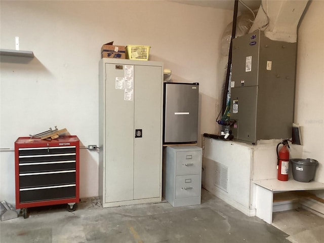 utility room with heating unit