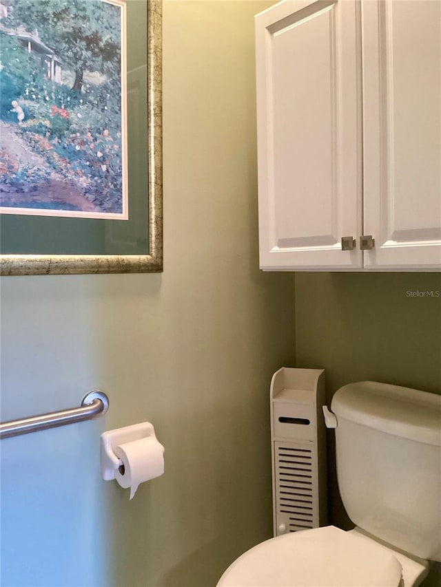 bathroom featuring toilet