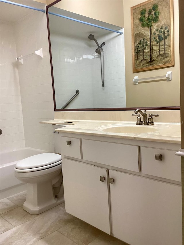 full bathroom featuring toilet, tiled shower / bath combo, and vanity