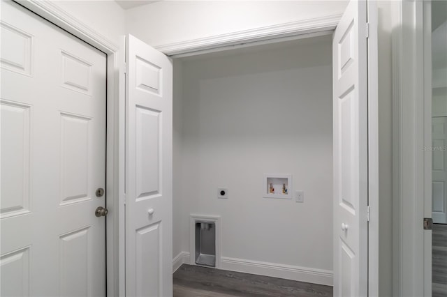 clothes washing area with washer hookup, dark wood-type flooring, and hookup for an electric dryer