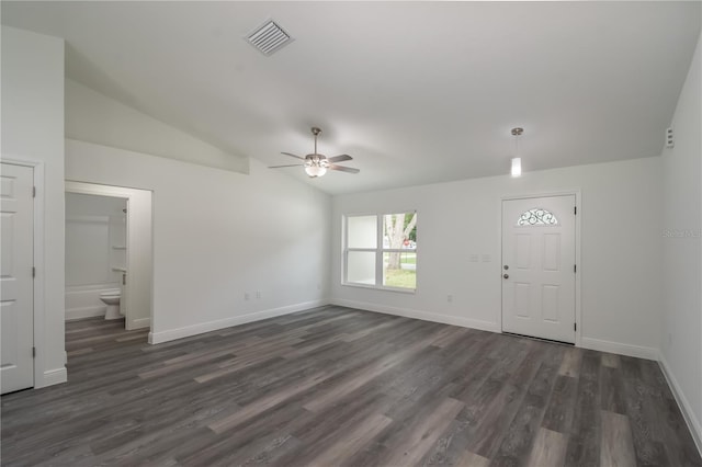 foyer entrance featuring lofted ceiling, a ceiling fan, dark wood-type flooring, and baseboards