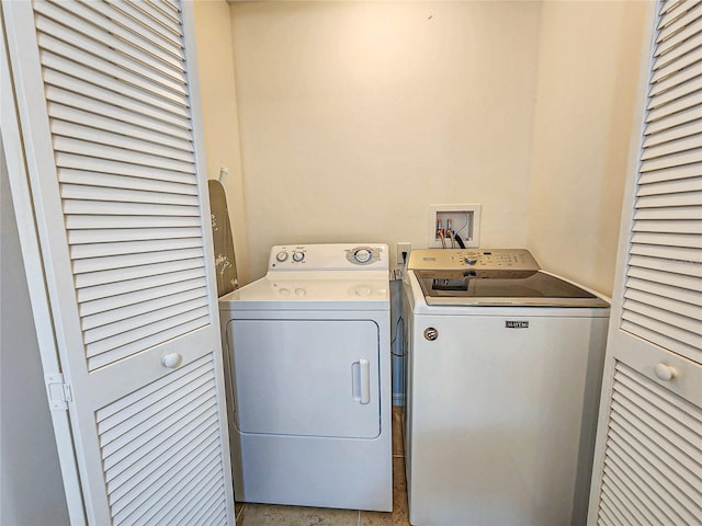 laundry area featuring washing machine and dryer