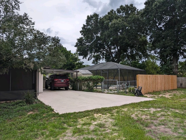 view of yard with a carport