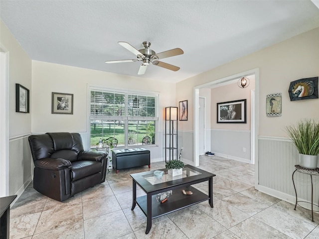 living room featuring ceiling fan