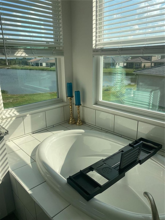 bathroom with a water view