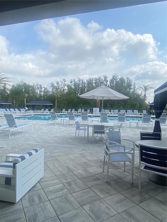 view of patio / terrace with a community pool