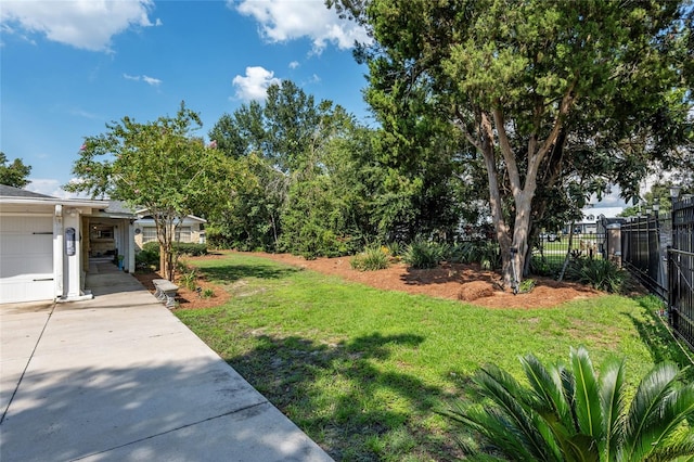 view of yard with a garage