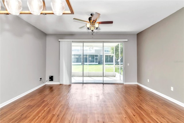 unfurnished room featuring ceiling fan and light wood-type flooring