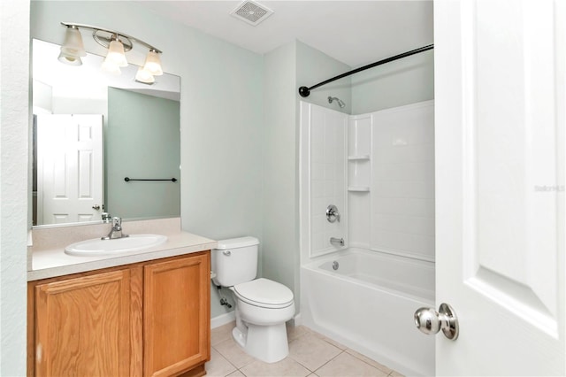 full bathroom with washtub / shower combination, tile patterned floors, toilet, and vanity