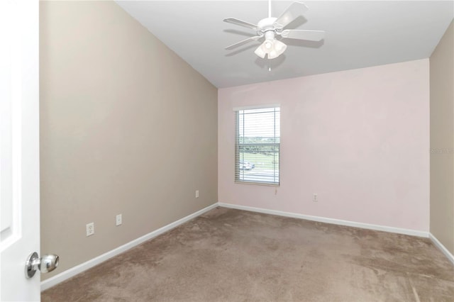 unfurnished room featuring light carpet, ceiling fan, and lofted ceiling