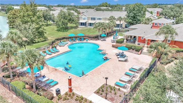 view of swimming pool with a patio area