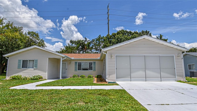 single story home with a garage and a front yard