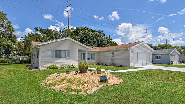 single story home with a garage and a front yard