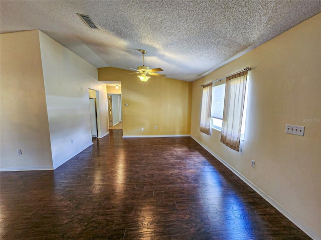 spare room featuring a textured ceiling, wood-type flooring, and ceiling fan