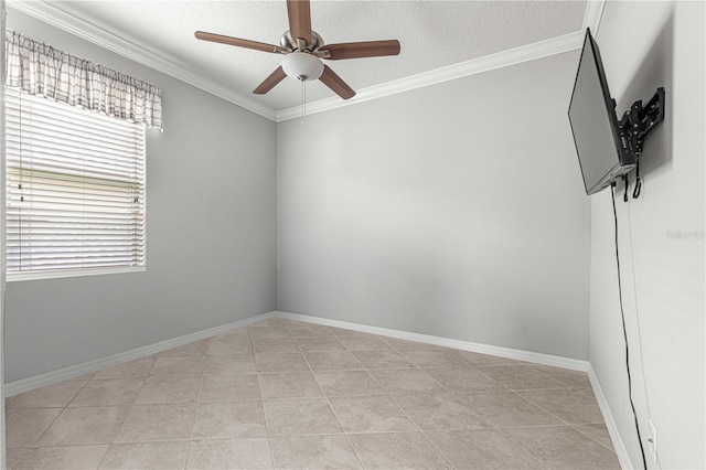 spare room with ceiling fan, light tile patterned floors, crown molding, and a textured ceiling