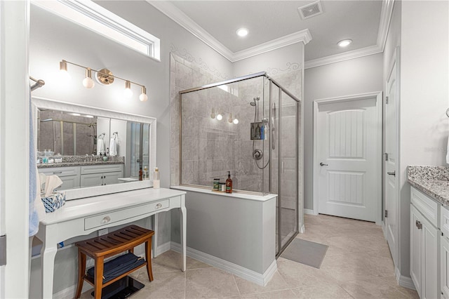 bathroom featuring vanity, visible vents, a stall shower, tile patterned flooring, and crown molding