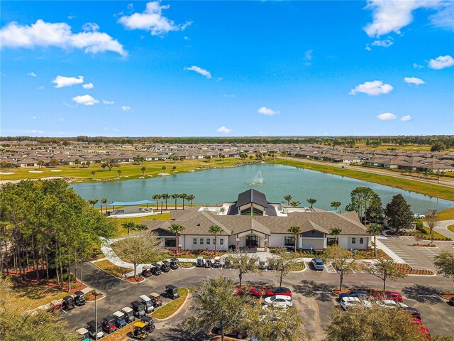 aerial view featuring a residential view and a water view
