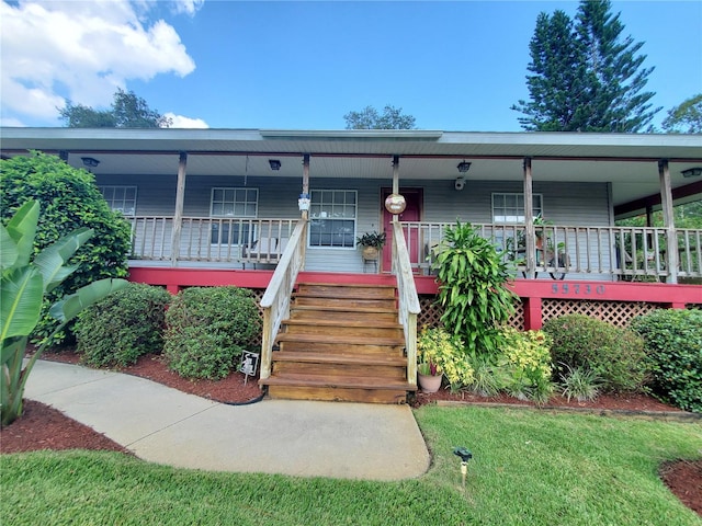 view of front of property featuring covered porch