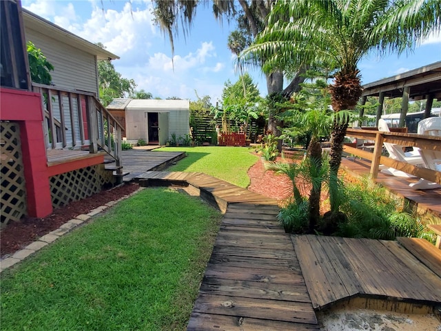 view of yard featuring a deck