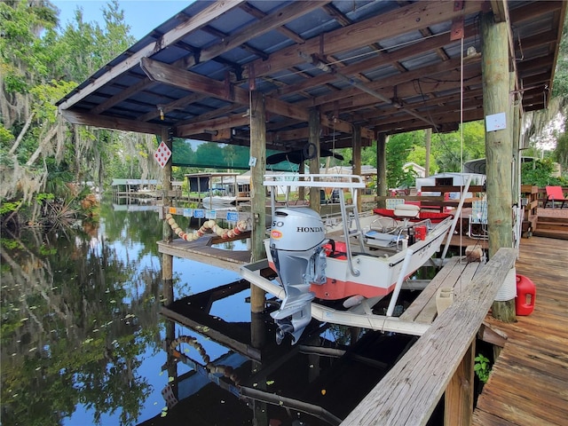 view of dock with a water view