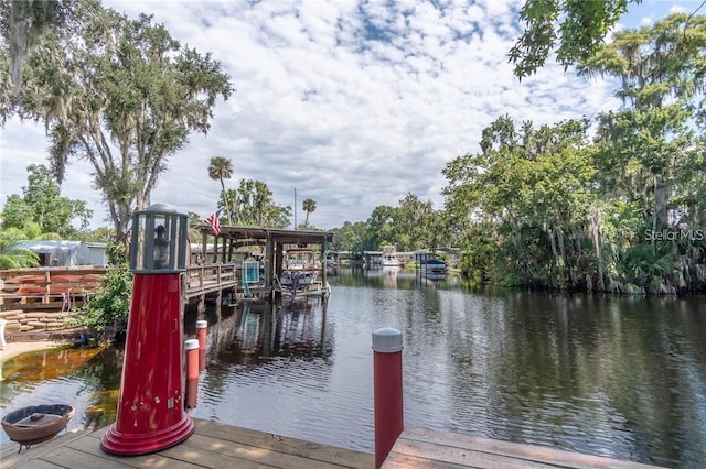 view of dock with a water view