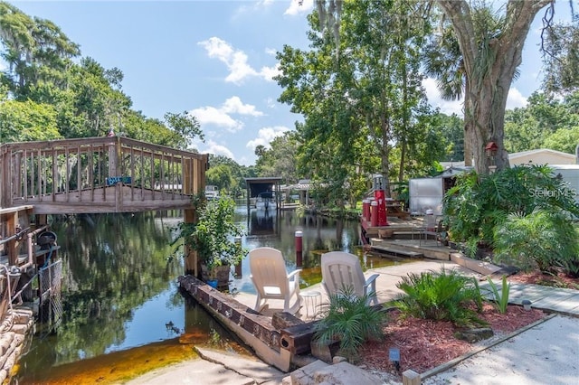 view of dock with a water view