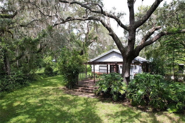 view of yard with a wooden deck