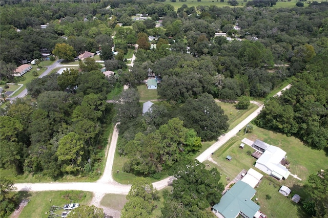 bird's eye view featuring a forest view