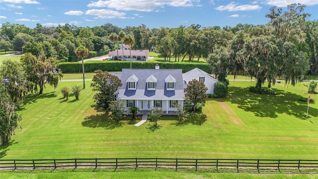 birds eye view of property with a rural view