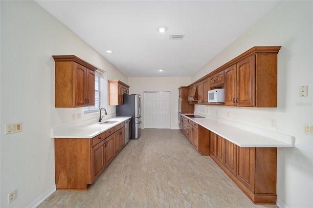 kitchen with sink and stainless steel appliances