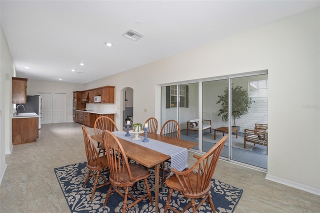 dining area featuring sink