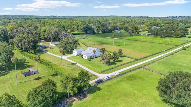 birds eye view of property with a rural view