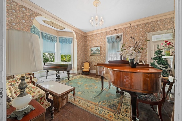 office space with crown molding, hardwood / wood-style floors, and a chandelier