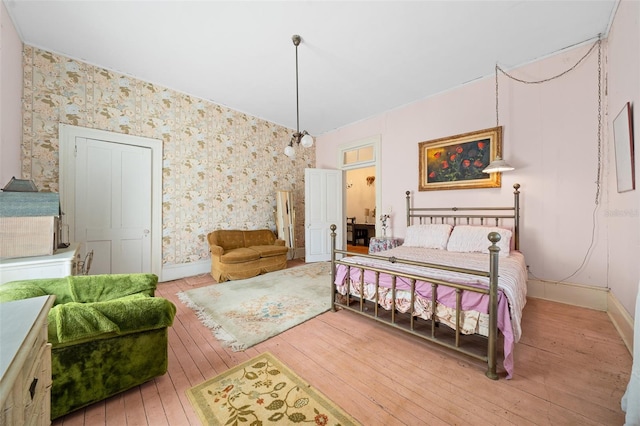 bedroom with wood-type flooring