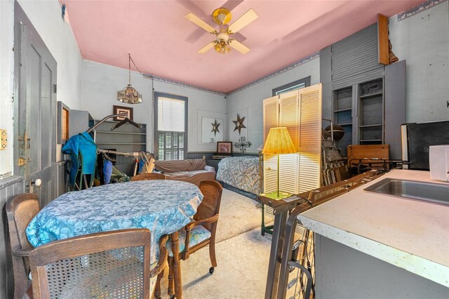 dining area with ceiling fan