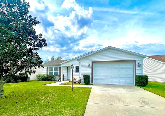 ranch-style home featuring a garage and a front yard