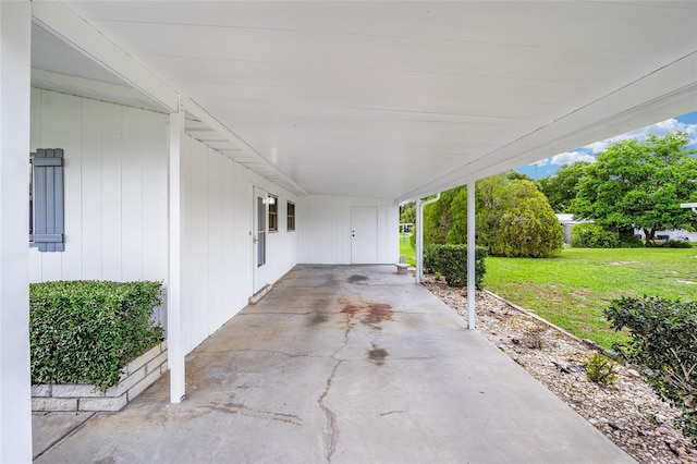 view of patio / terrace with a carport