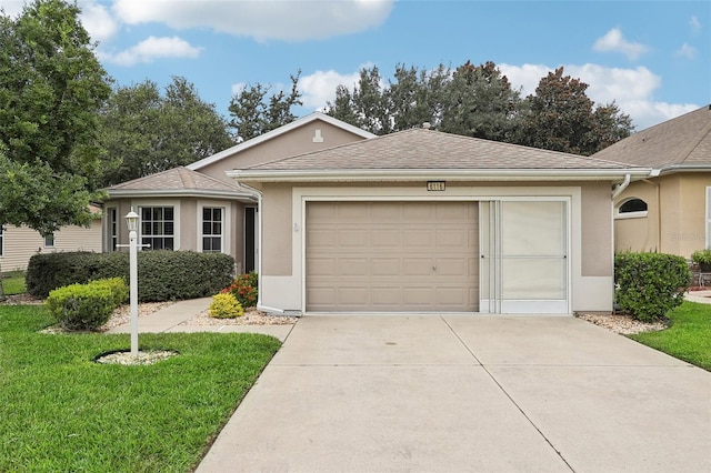 single story home with a front lawn