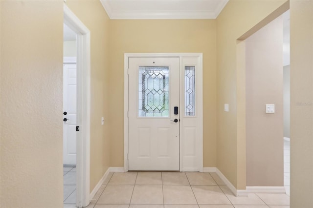 tiled entryway with ornamental molding