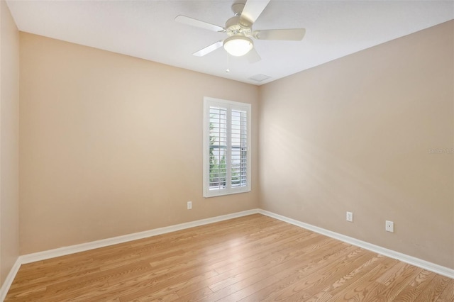 unfurnished room featuring ceiling fan and light hardwood / wood-style floors